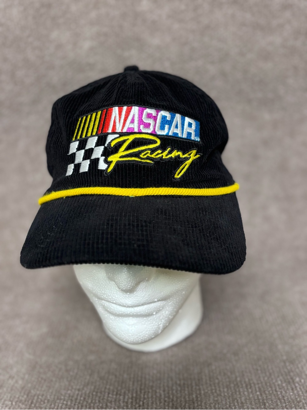 Nascar Black Cap with Yellow Piping and Multicolor Embroidered Logo